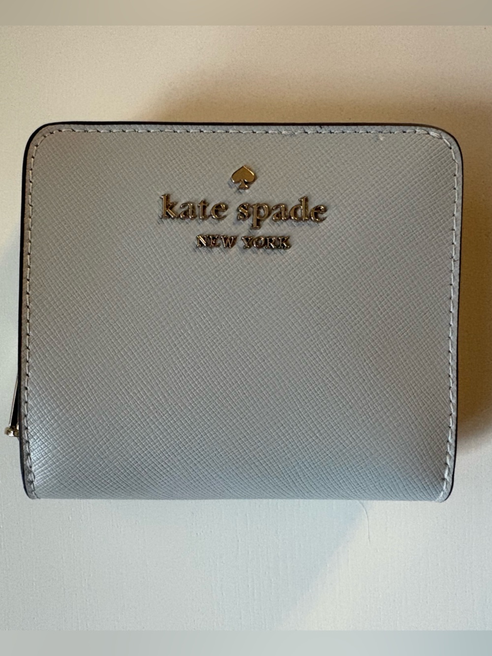 kate spade staci small zip around wallet in stone path